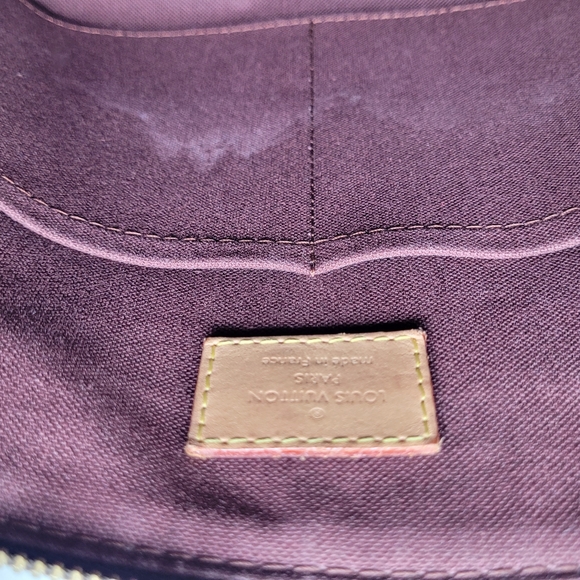 LOUIS VUITTON RIVOLI PM - Picture 12 of 15